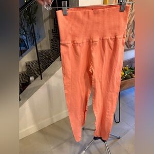 Free people movement $78 coral leggings size M/L NWOT